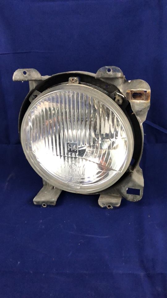 Gebruikte koplamp Links T3 HELLA H4